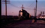 SBD 8002 leads a southbound train past the station